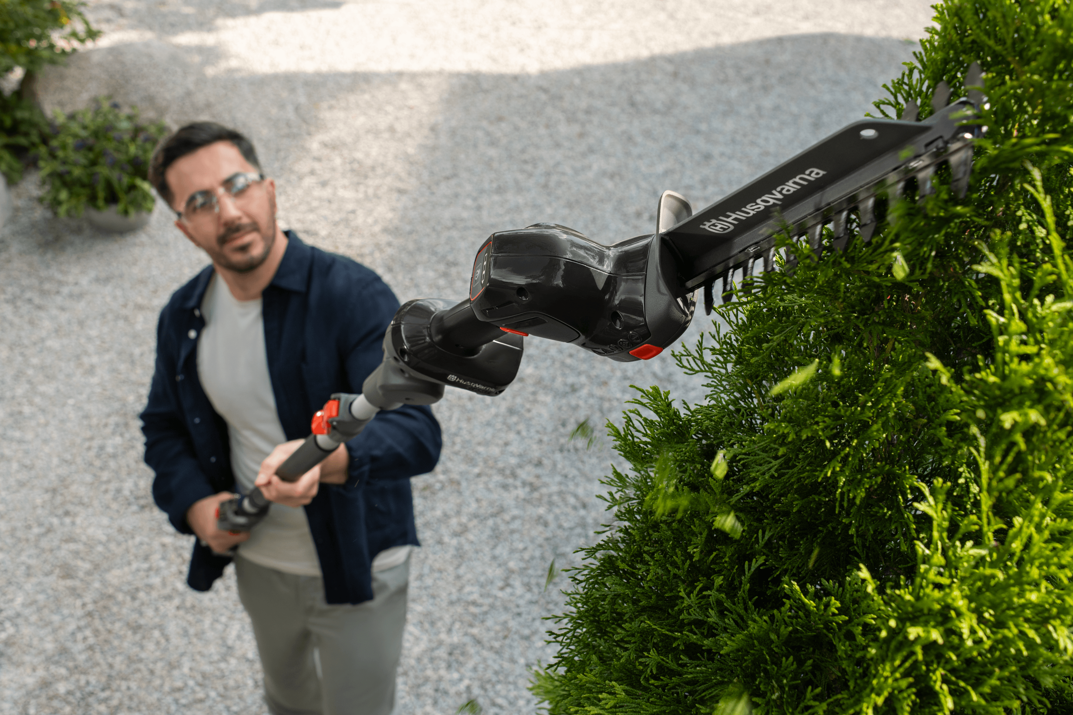 Man shaping with Aspire Shrub Shear